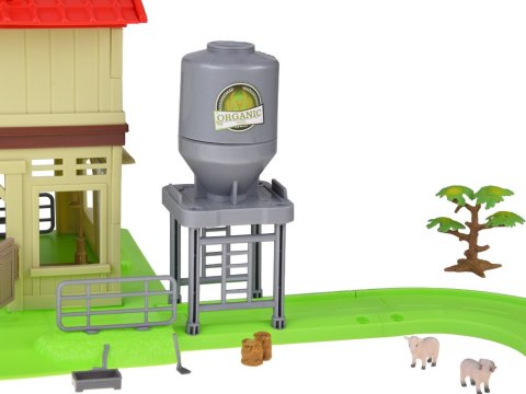 SERIA ZWIERZĘTA FARMA Stodoła z drogą + traktor, figurki i akcesoria ZA5687