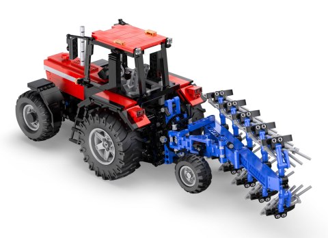 Klocki techniczne r 1675 el. Zdalnie sterowany Traktor z pługiem Eric Trax
