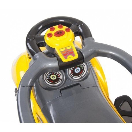 Jeździk z popychaczem i grąjacą kierownicą żółty